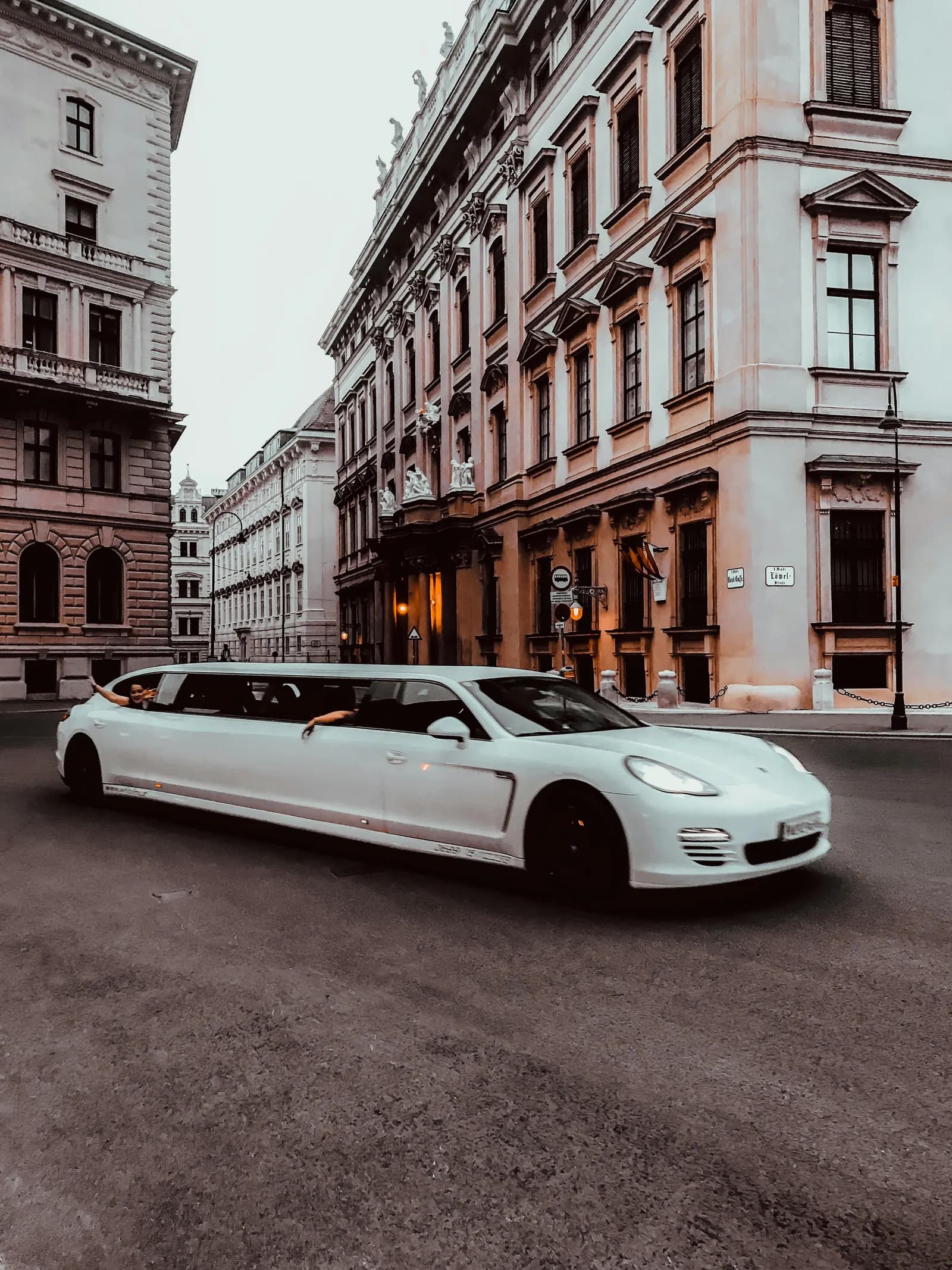 Party bus and limousine side by side, the two vehicle types most Phoenix groups compare
