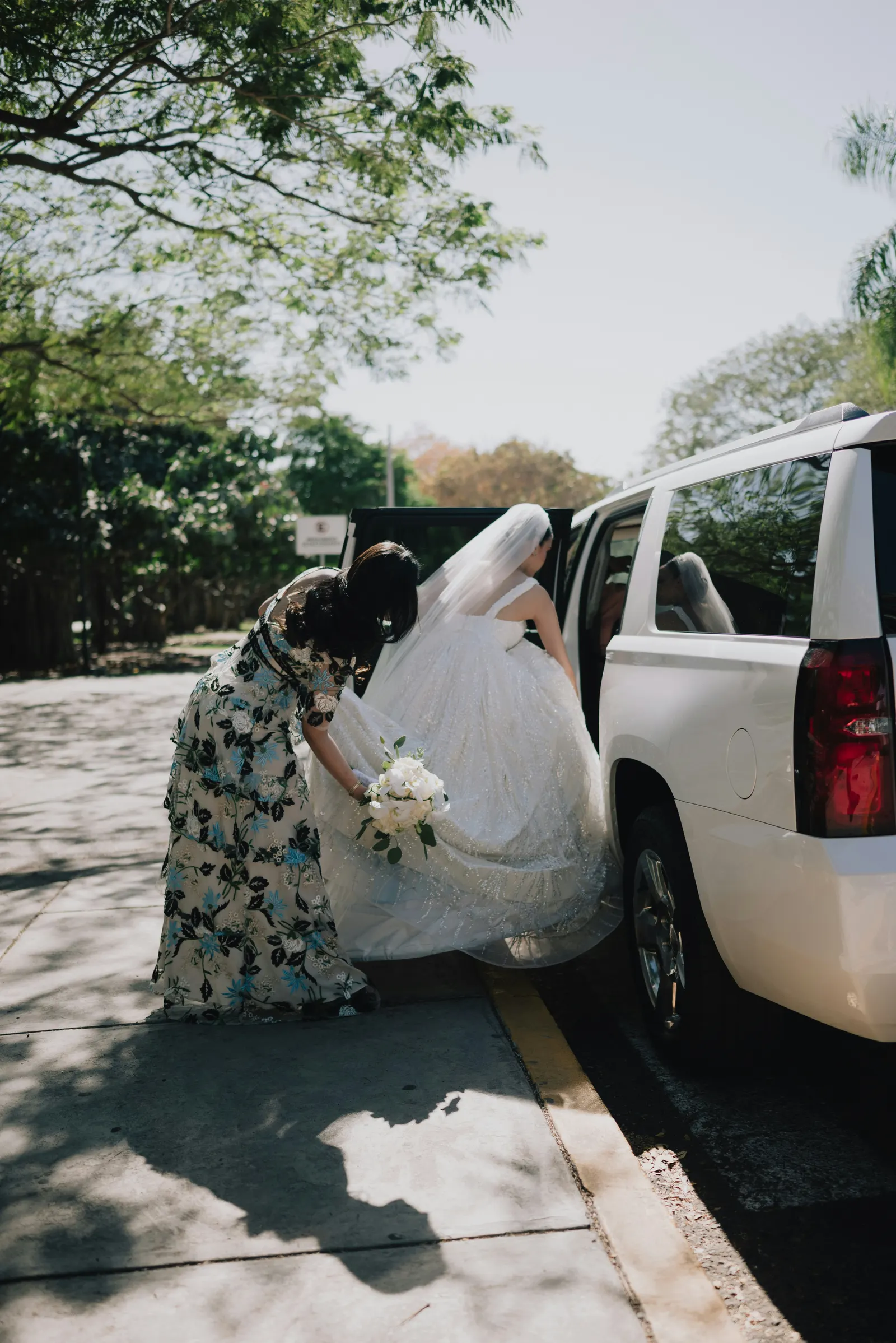 Wedding guests arriving by shuttle at a desert ceremony venue near Phoenix
