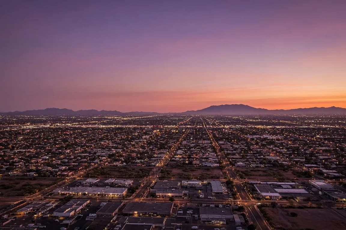 Phoenix metro street grid lit up at dusk