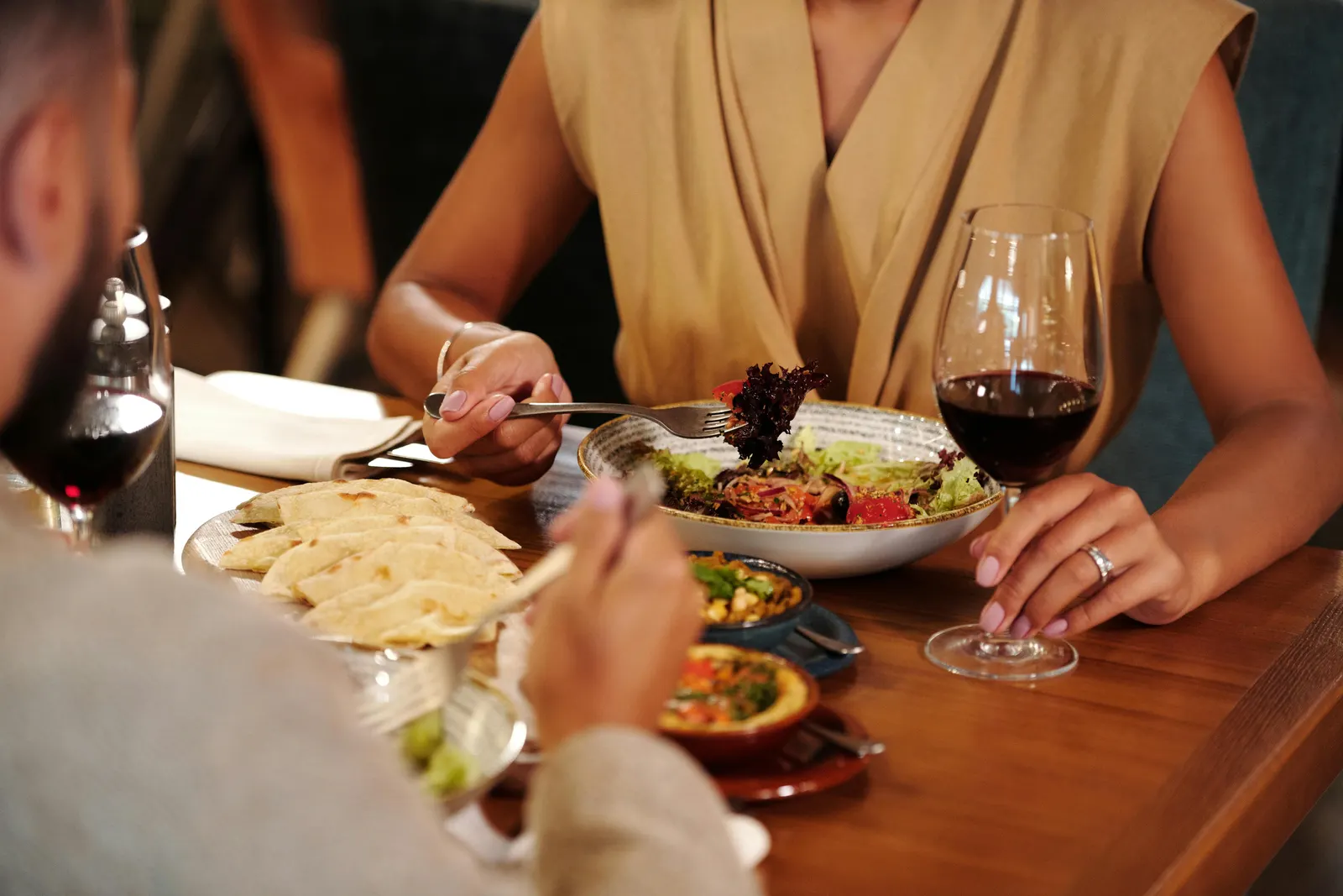 Dressed-up group arriving for a dinner reservation in Phoenix by chauffeured vehicle